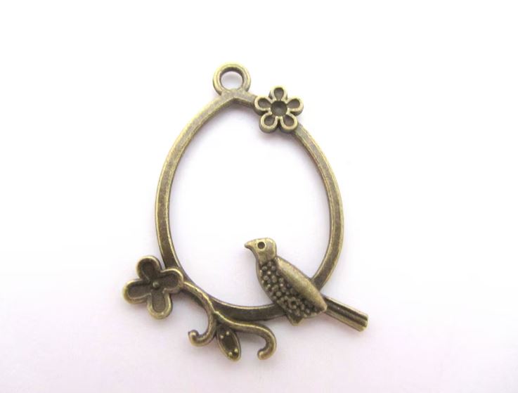 Large pendant, charm, bronze bird