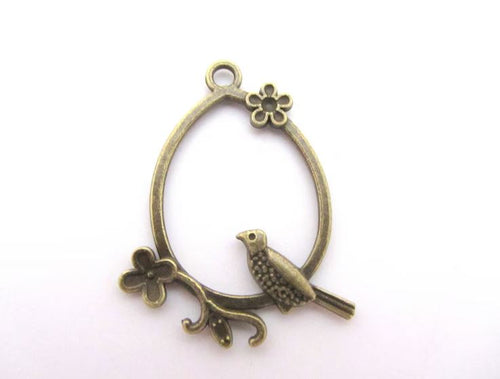 Large pendant, charm, bronze bird